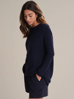 Side view of relaxed fit crewneck in Dark Blue