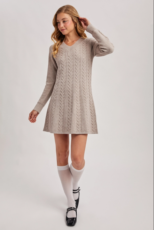 Cable knit V-neck sweater mini dress in a fit-and-flare silhouette