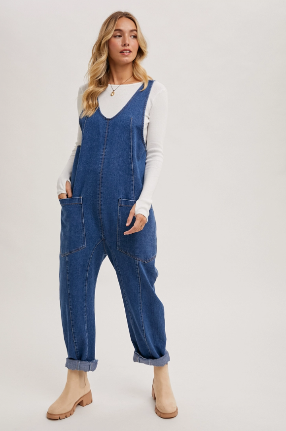 Sleeveless denim jumpsuit with harem legs in relaxed fit