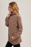 Soft knit mock neck tunic sweater in a contemporary casual style
