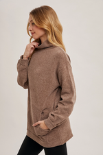 Soft knit mock neck tunic sweater in a contemporary casual style