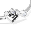 Close-up of double heart design with crystal on open bangle