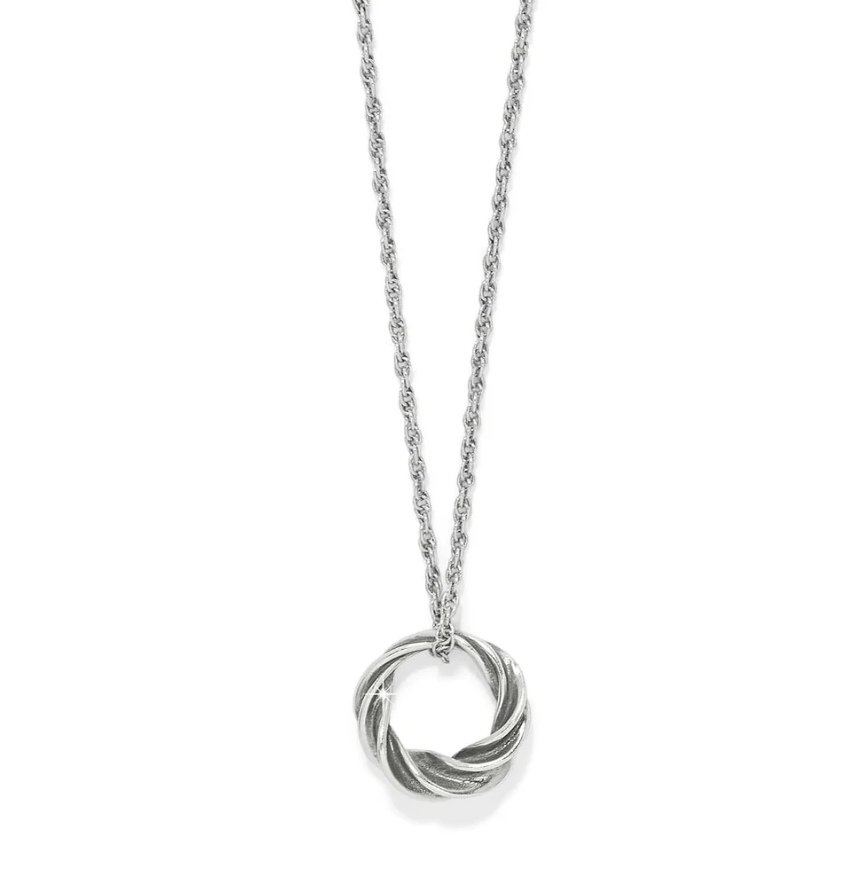 Antica Petite Necklace with twisted silver pendant on white background