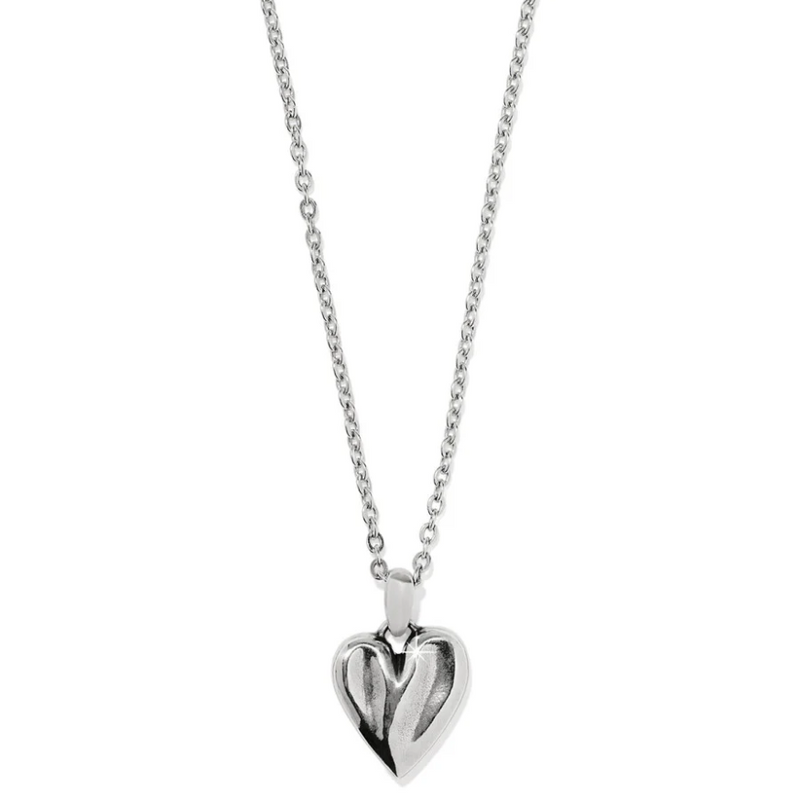 Two-tone sculpted heart necklace inspired by coastal elegance