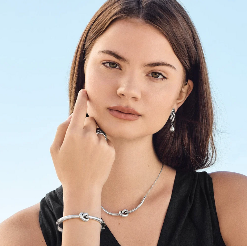 ​Model wearing Brighton Interlok Single Knot Necklace showcasing elegance​