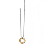 Flat lay of two-tone pendant necklace