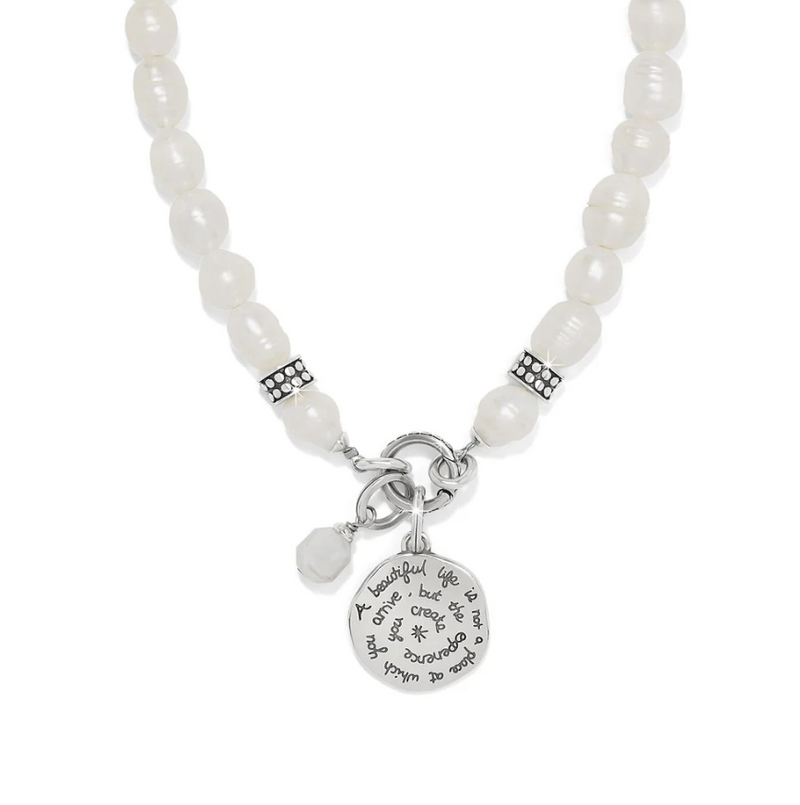 Brighton pearl strand necklace with silver charm centerpiece