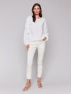 Front view of relaxed fit cotton blouse with embroidered eyelet details in white