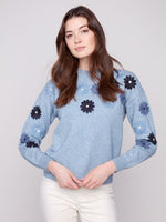 Women’s knit sweater with flower embroidery on front and sleeves