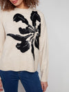 Detail of bold flower knit pattern on Charlie B sweater