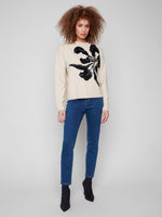 Cozy crew neck sweater with large floral design