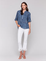 Relaxed fit striped cotton blouse styled for summer