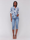Lightweight button-down blouse with embroidered eyelet pattern