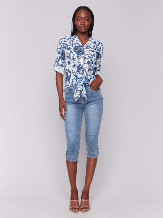 Lightweight button-down blouse with embroidered eyelet pattern