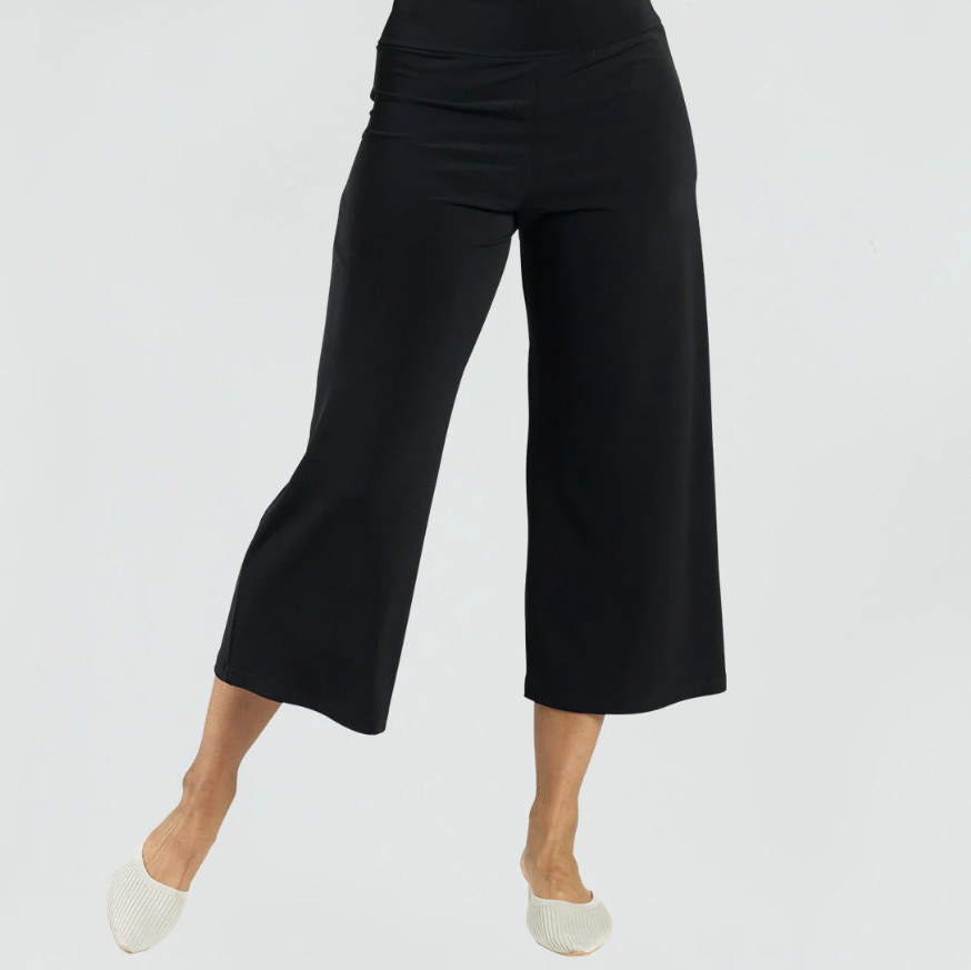 Front view of Clara SunWoo cropped gaucho pants with wide-leg silhouette in black