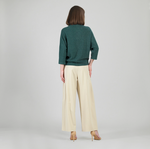 Clara Sunwoo ribbed funnel neck sweater displayed on model