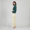 Side view of faux cashmere sweater with ribbed detail