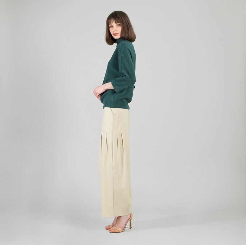 Side view of faux cashmere sweater with ribbed detail