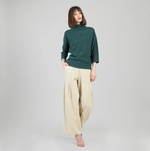 Clara Sunwoo ribbed funnel neck sweater displayed on model