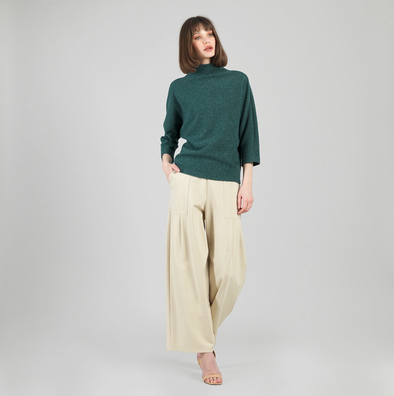 Clara Sunwoo ribbed funnel neck sweater displayed on model