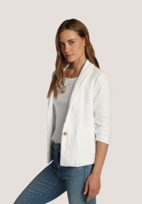 Chic cotton blazer styled over a dress for effortless coastal layering