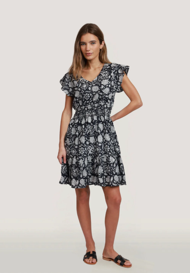 Front view of midi-length floral dress with rouched waist and v-neckline

