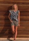 Front view of relaxed cotton popover blouse with open neckline
