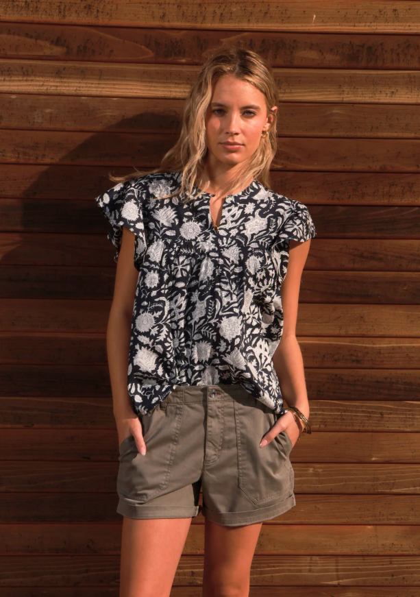 Dylan Magnolia Top in black and white floral print at The Lazy Daisy
