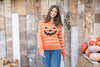 Jack-O-Lantern Stripe Crew sweater with knit pumpkin face and stripes