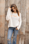 Front view of Pumpkin Striped Crew with “Pumpkin” embroidered on stripes