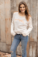 Front view of Pumpkin Striped Crew with “Pumpkin” embroidered on stripes