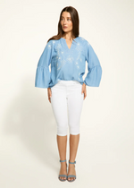 Pedal pusher pants styled with a casual summer top