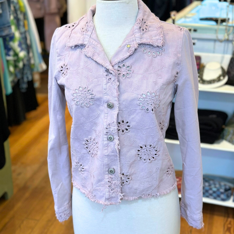Femme Fatale Embroidered Eyelet Jacket – Women's cropped spring jacket with button front, eyelet embroidery, frayed edges, and soft stretch jersey sleeves and back. Stylish and versatile layering piece. In the color Dusty Rose.