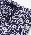 Close-up of soft cotton-modal fabric in colorful wavy floral print