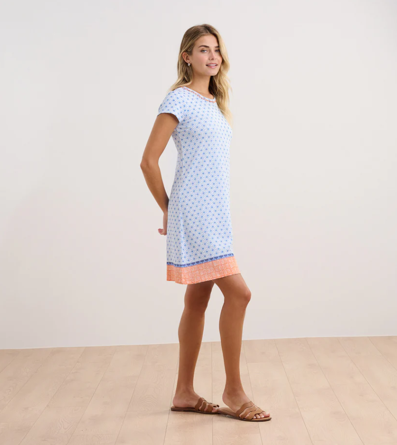 Flattering A-line knit dress with pom pom trim and keyhole closure at back