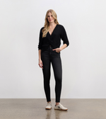 Model wearing Hatley V-neck cross over sweater with jeans