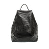 Maggie Modern Backpack in distressed vegan leather with adjustable straps.
