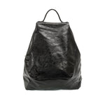 Maggie Modern Backpack in distressed vegan leather with adjustable straps.