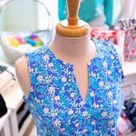 Close-up of Lulu-B dress notch neckline and tropical pattern – perfect for coastal vacations in the pattern SHBY