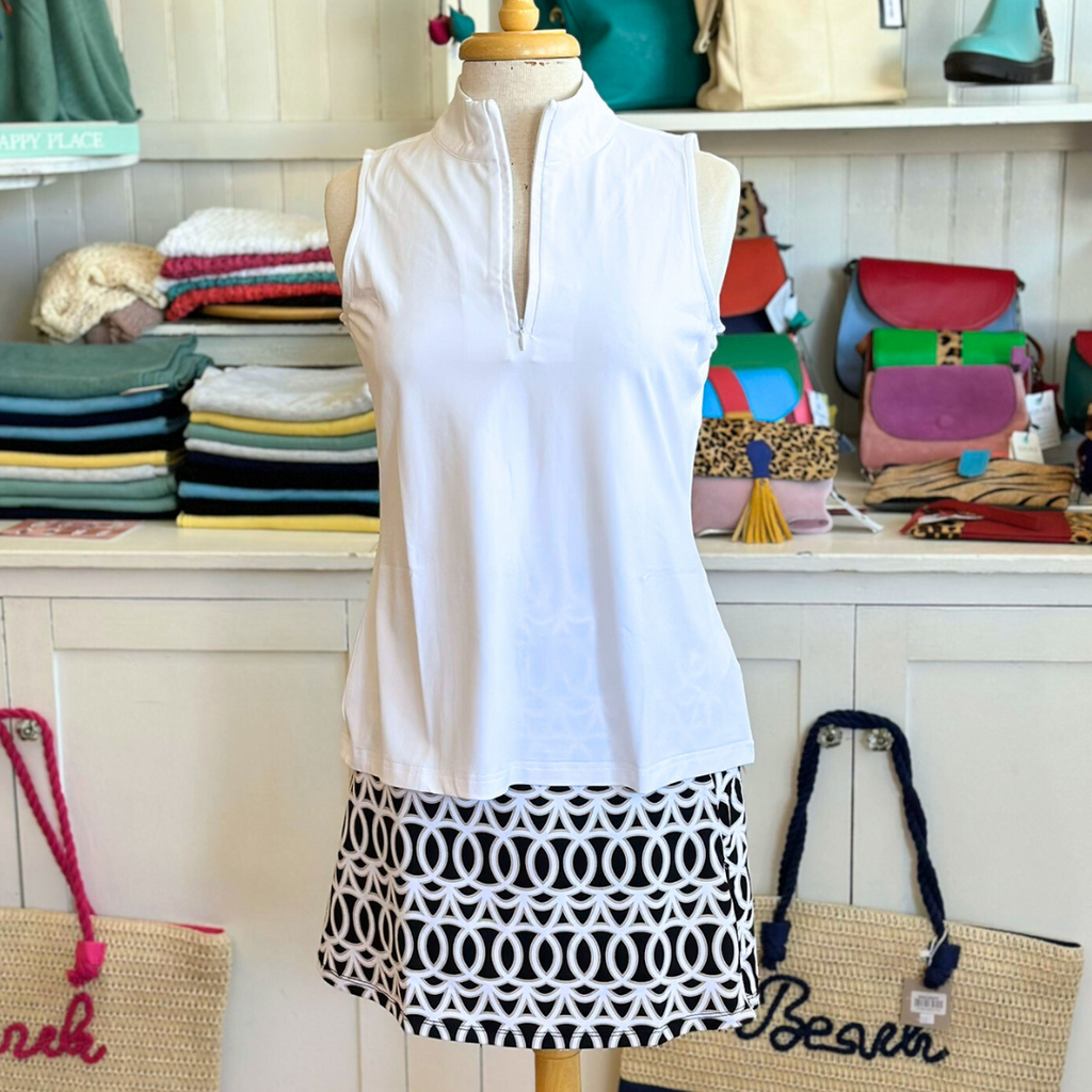 Lulu-B Sleeveless Zip Tank with UPF 50+ protection, zip neckline, and fitted sleeveless silhouette – perfect for sunny days, travel, and golf. In the color White.
