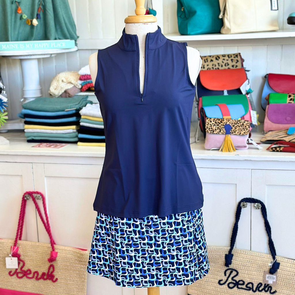 Lulu-B Sleeveless Zip Tank with UPF 50+ protection, zip neckline, and fitted sleeveless silhouette – perfect for sunny days, travel, and golf. In the color Navy.
