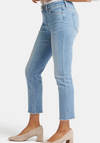 Eco-friendly NYDJ Sheri Slim Jeans styled with neutral spring sweater from The Lazy Daisy