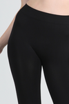 Close-up of ankle length jersey knit leggings in black from The Lazy Daisy