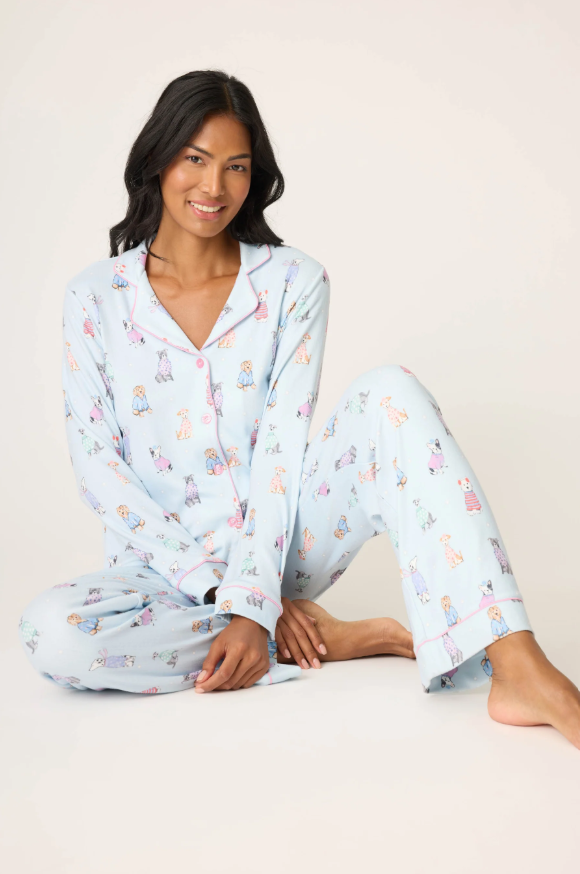 Women’s light blue pajama set with playful winter dog print.