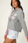 Front view of women’s grey hoodie with colorful holiday-style lettering.