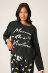 Black fuzzy sweater featuring festive martini holiday text.