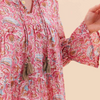 Boho-style cotton blouse with shirred placket and ruffle cuff sleeves