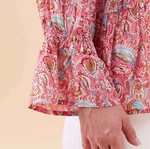 Full-length sleeve with elastic ruffle cuff – feminine and breezy top