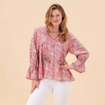 Boho-style cotton blouse with shirred placket and ruffle cuff sleeves