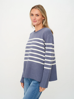 “Women’s striped crew neck sweater with side V-cut detail”